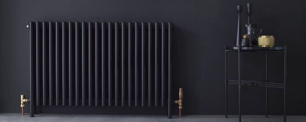 Anthracite modern radiator with gold valves