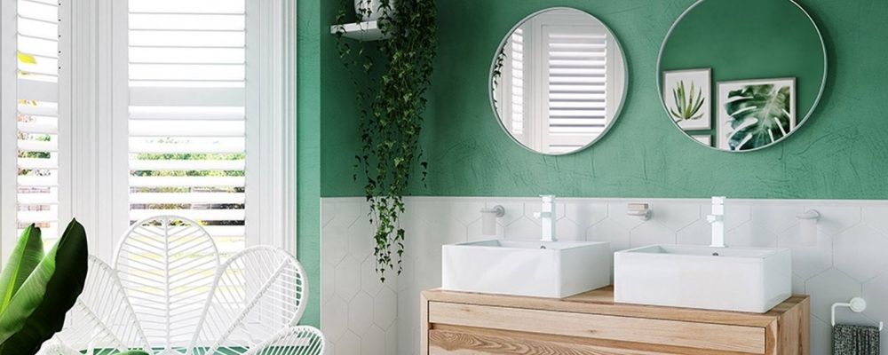 White bathroom accessories with matching white mirrors