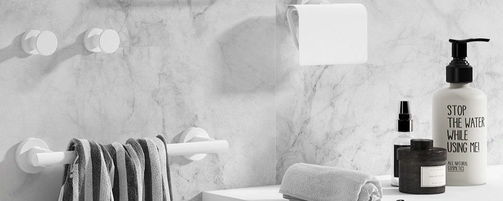 White bathroom accessories robe hooks toilet roll holder and towel ring